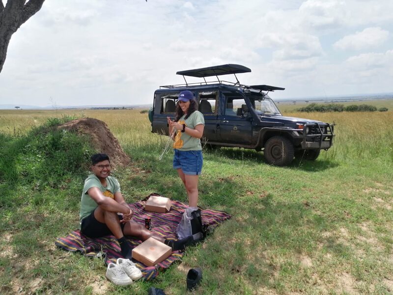 Bush picnic beside Safari World vehicle